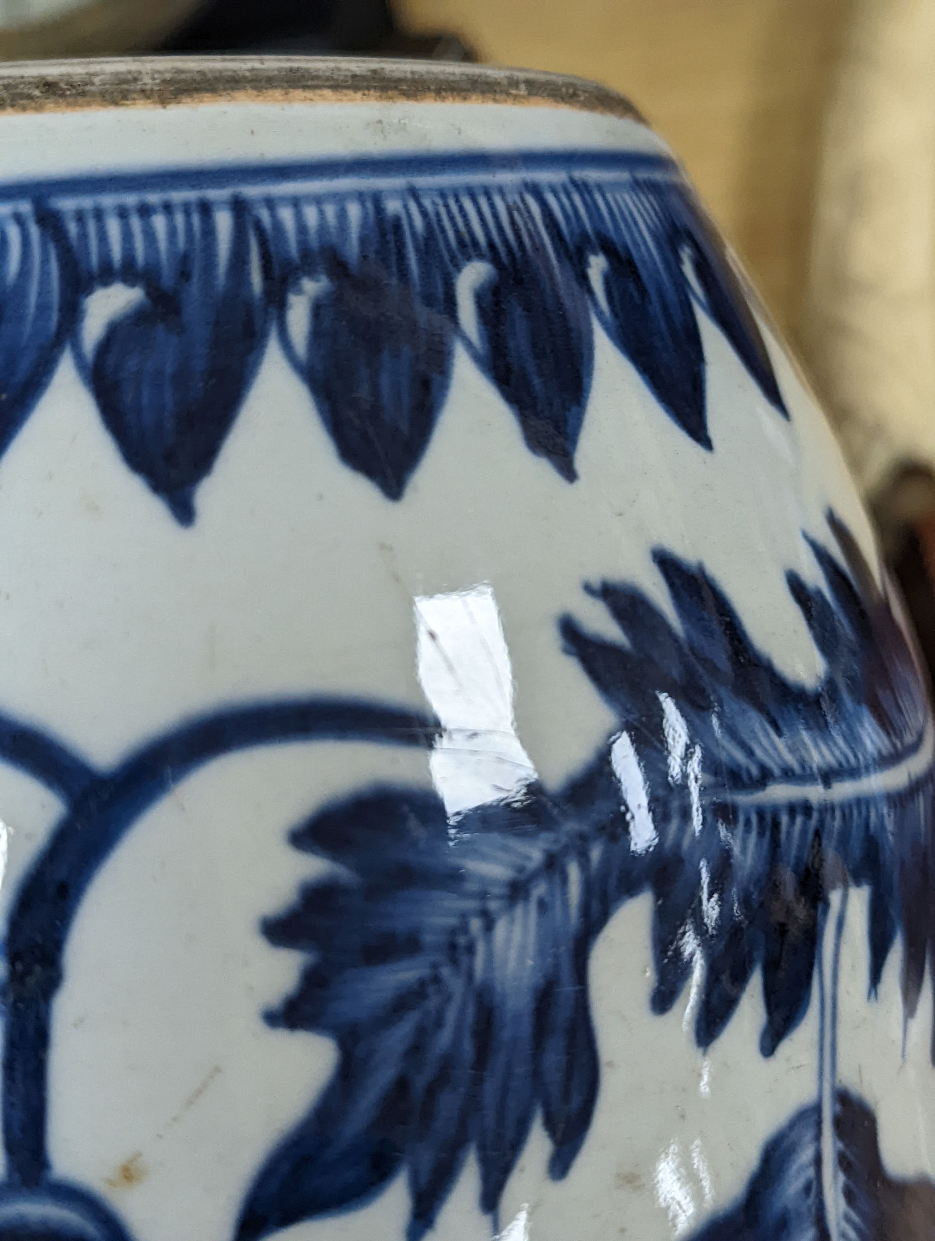 A 18th/19th century Chinese blue and white jar and wood cover - 22cm high